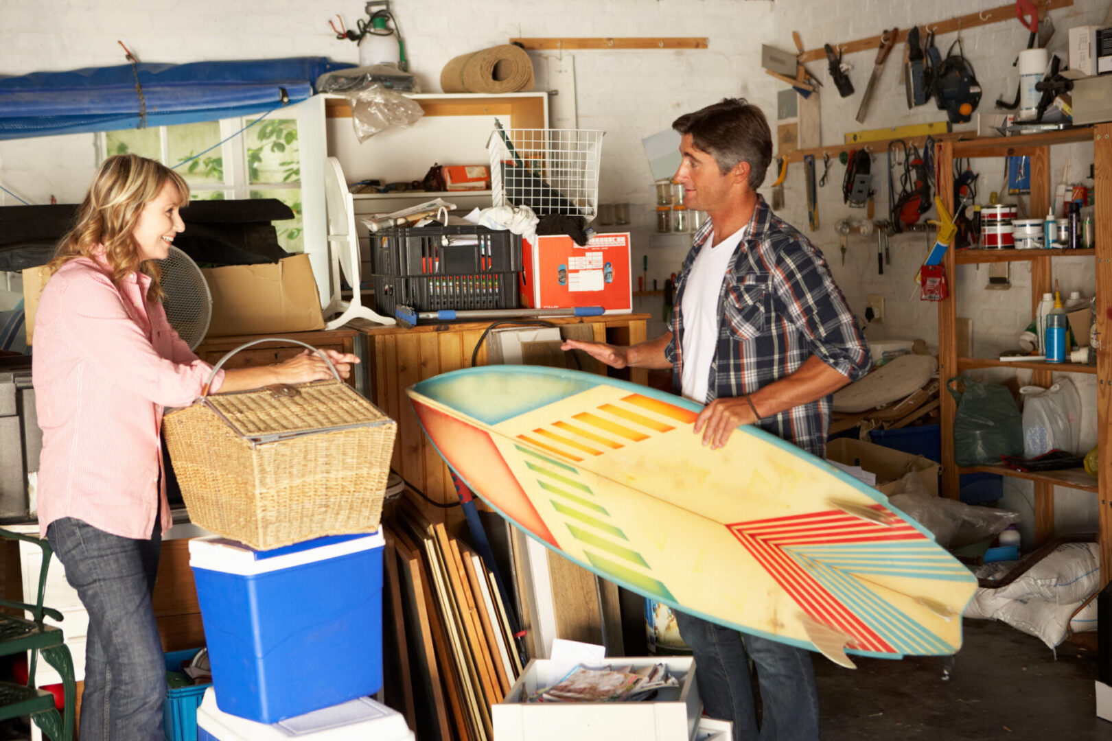 Couple Clearing Garage For Yard Sale